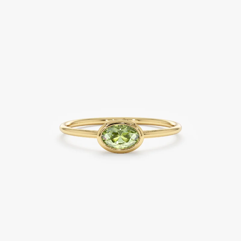 Oval Peridot Ring In Solid Gold, Linda