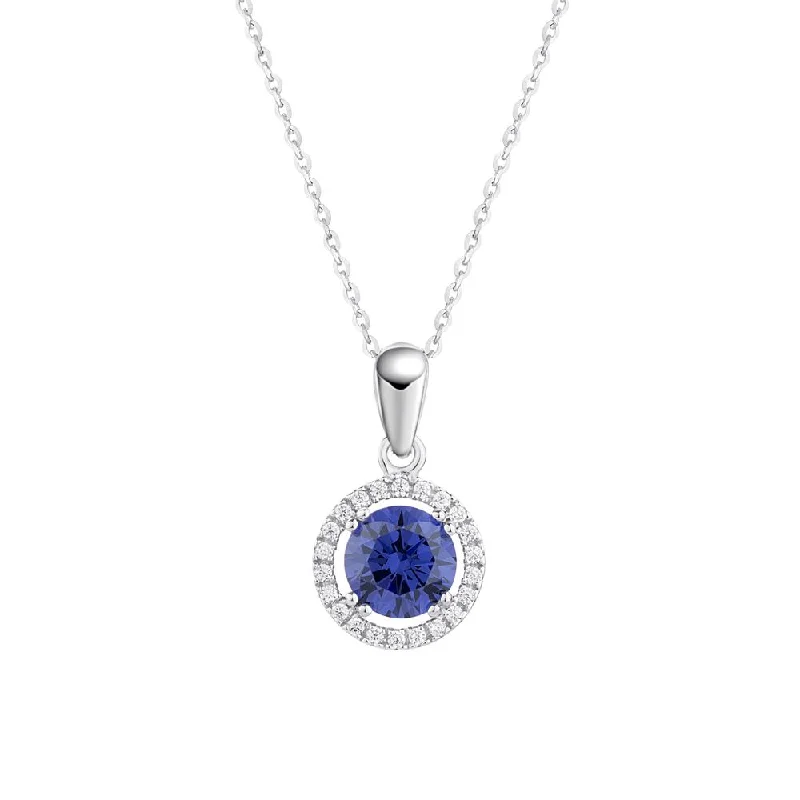 Halo pendant with tanzanite simulant and 1.13 carats* of diamond simulants in 10 carat white gold