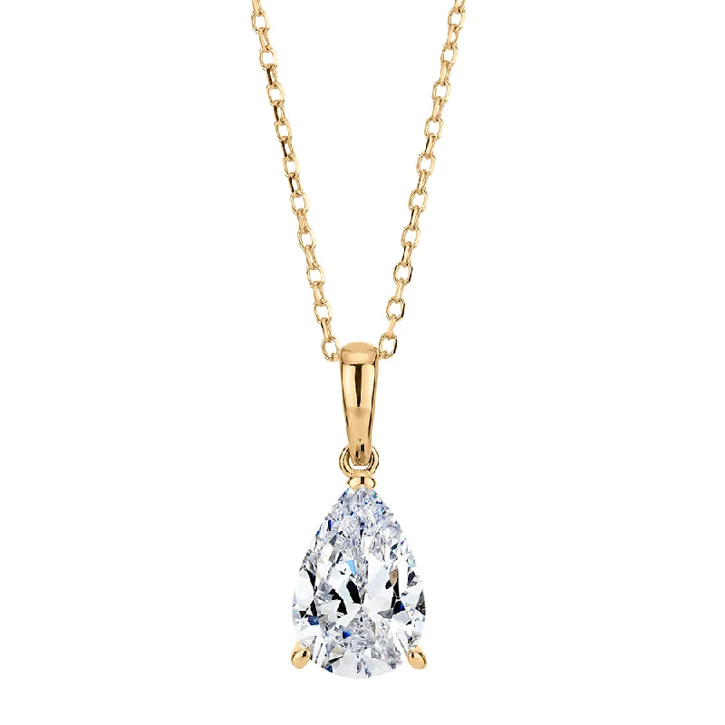 Pear and Round Briliant solitaire pendant with 1.4 carats* of diamond simulants in 10 carat yellow gold